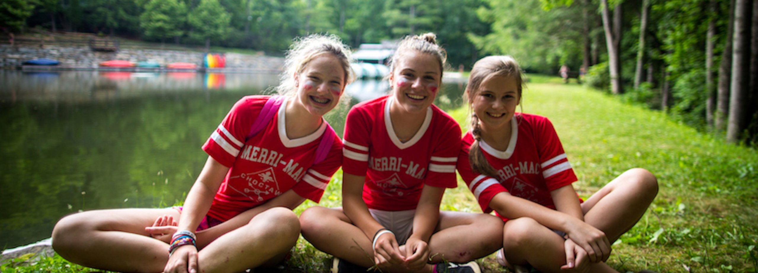 Campers smiling for group photo.